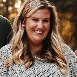 Smiling woman with long blonde hair